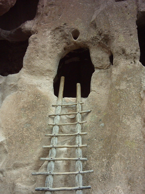 Looking up at a preserved cliff dwelling
