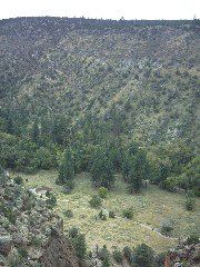 Climbing down the switchbacked Frey Trail into Frijole Canyon.  The archeological sites are far below
