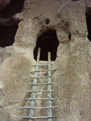 Looking up at a preserved cliff dwelling