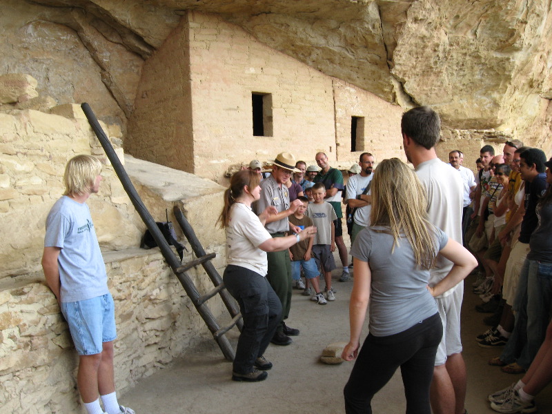 I volunteer to let the tour guide make a fool of me (reinacting the life of a Puebloan woman)