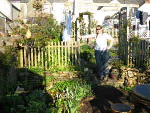 Susan enjoys the spring sunshine in the beautiful gardens.