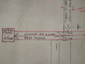 Instructions to wiring crew at Tube rennovation works, drawn on a wall in Leicester Square tube station.