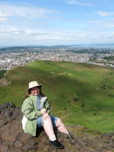 Susan enjoying the sunshine atop Arthur's Seat