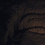 IMG_3874 This is one shot of "Frozen Niagra" -- the largest formation in the cave and one of the largest single curtain formations in the country. I couldn't capture it all without a powerful strobe and a wide-angle lens; this is just a fragment of it.