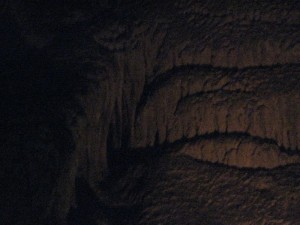 This is one shot of "Frozen Niagra" -- the largest formation in the cave and one of the largest single curtain formations in the country.  I couldn't capture it all without a powerful strobe and a wide-angle lens; this is just a fragment of it.